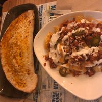 Calzone y nachos  at Viva Chapata in Madrid