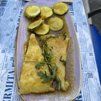 Tortilla en salsa con calabacines  at Viva Chapata in Madrid