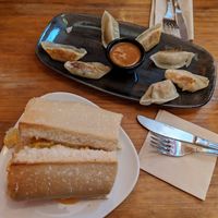 gyozas and bread with tortilla at Viva Chapata in Madrid