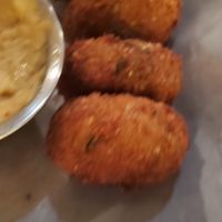 Garbanzo Kefte (a few missing 😏) & hummus at Nisi Greek Taverna in Schererville