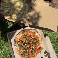 Cheesy garlic sticks (actually like a smaller pizza) and seitan pesto pizza   at Pizza Attack in Coyhaique
