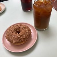 Vegan cinnamon crumble donut and cold brew with oat milk  at Hook and Press in Santa Barbara