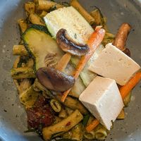 My partner's pasta dish with vegan cheese yummy at Kynd Kulture in Bangkok