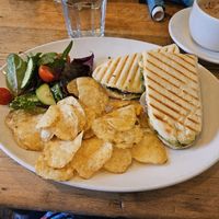 Vegan roast veg, pesto and vegan cheeze panini served with crisps and side salad at Nosh in Pickering