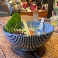 Vegan ramen and the open kitchen in the background. at Taboe Bar & Keuken in Zwolle