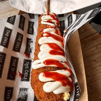50/50 vegan corn dog with sriracha and vegan mayo  at The Deli in Brighton