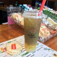 mango green tea with lychee bobas  at Ai Cha Milk Tea in Lexington
