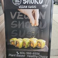 sign outside restaurant at Vegan Shoku in Vancouver