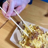 Mac and cheese with chopstickss  at REDWHITE BONELESS RAMEN - Studio City in Studio City