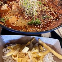 Hot and spicy miso ,no corn 🌽 I got the combo with the cheese rice to help soak up all the liquid in the end great way to go!   at REDWHITE BONELESS RAMEN - Studio City in Studio City