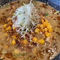 Expensive yuzu ramen…noodles, corn and few pieces of arugula for $19! Don’t worry you get plenty of oil to weigh you down, lots of it!   at REDWHITE BONELESS RAMEN - Studio City in Studio City
