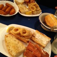 En la foro: un montadito de calamares, otro de bacon, y una ración de croquetas de calabaza at B13 Bar in Madrid