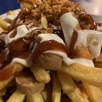 Salchipapas at B13 Bar in Madrid