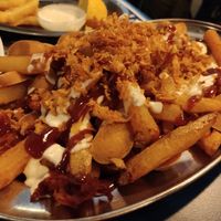 Salchipapas at B13 Bar in Madrid