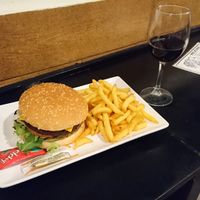 Hamburger, french fries and red wine - Rioja crianza - in great place at B13 Bar in Madrid