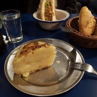 Delicious tortilla and hot dog at the back at B13 Bar in Madrid