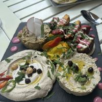 Vegan platter for 4: hoummus, falafel, babaganoush, eggplant tartar  at Aubergine - Aviatorilor in Bucharest