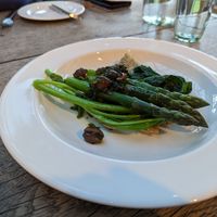 Chickpea pancake with green asparagus. Come de rapa and black olives at Marle in Hook