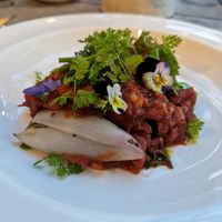 Shallots with freekah, spiced tomato sauce and prunes at Marle in Hook