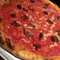 Tomato pie with Kalamata olives and pickled Fresno chilies   at The Little Grand in Washington