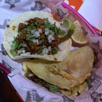 Taco with vegan chorizo (left) and quesadilla with seitan and vegan cheese (right)  at El Tejano Tacos in Puerto Natales