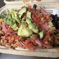Salad with rice, pinto and black beans, roasted corn, avocado, pico, and pickled onions    at The Avocado Pit  in Manchester Center