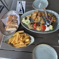 Vorspeisenteller mit extra Pommes  at Taverna Athene in Berlin