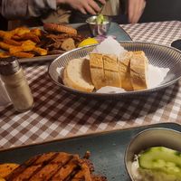 Mixed grill with French fries and bread at Taverna Athene in Berlin