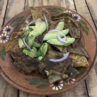 chilaquiles with mole sauce  at Espacio Nómada in Xalapa