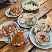 Vegan starters; bruschetta, hummus, melon, patatas bravas   at The Garden  in Lagos