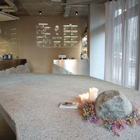 Menu projected onto wall at JIGI Poke in Berlin