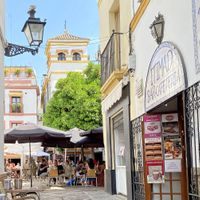 Links in de onder hoek van deze foto zie je net nog een stoel en tafeltje. Vanaf daar dit uitzicht.  at Itimad in Sevilla