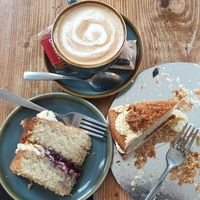 Black currant sponge cake and biscuits cake at Common Meeple Board Game Cafe in Swansea