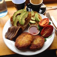 Hash browns, smokey rasher, toast, avocado, roasted tomato and baby spinach at Suzy Spoon's Vegetarian Butcher in Marrickville