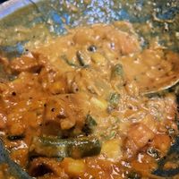 Vegetable Kozhambu: this is more than half eaten but I wanted a pic to remember in the future so I’ll order again. Very good    at Nazara Indian Bistro in Cary