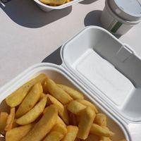 chips with curry sauce   at Canoe Lake Cafe in Southsea