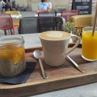 Chia pudding, orange juice and double latté at Caffe Gufo in Dijon