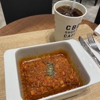 Their take on Lasagne… and a rather potent cold coffee….  at HealthyTOKYO CBD Shop & Cafe - Shinjuku in Tokyo