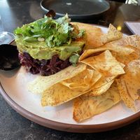 Avocado and beet salad sashimi with taro chips   at PLANTA Queen in Washington