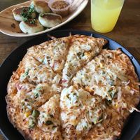 Stuffed Potato Cakes & Roasted Potato and Veggie Signature Pizza. at Pizza Karma in Apple Valley