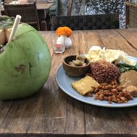 Vegan Nasi Campur and a fresh coconut   at Lilla Pantai in Denpasar