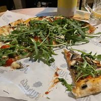 Sorry it’s half eaten. It was yummy! Mushroom and rocket with vegan cheese .  at Alfred's Pizzeria in Perth