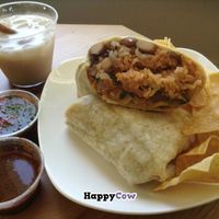 Salsa from salsa bar, vegan horchata, vegan burrito with soy beef. at Tacos Cancun in Costa Mesa