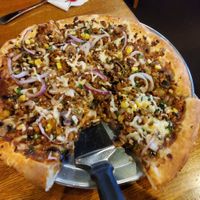 Spicy Thai with spicy tofu, vegan cheese, and added mushrooms. at Giovanni's Restaurant and Bar in Mammoth Lakes