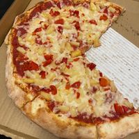 Vegan! Got a medium pizza with roasted red pepper, pineapple, and vegan cheese. at Giovanni's Restaurant and Bar in Mammoth Lakes