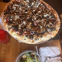 16” vegan pie with spicy tofu, onions, mushrooms, black olives, garlic   at Giovanni's Restaurant and Bar in Mammoth Lakes