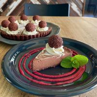 チョコレートタルト。トリュフも大粒！ラズベリーソースのデコレーションも美しい！  at Blue Point Falafel & Coffee in Yomitan