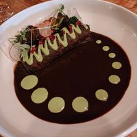 BLACK PEARL OYSTER (GF)

mole, enchilada, epazote sour cream, broccolini at Third Kingdom in New York City