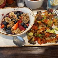 A. M. Superfoods Bowl & Roasted potatoes with avocado, roasted tomato, and mushrooms.   at First Watch in Columbus