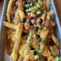 Loaded fries (with cheese and chilli) at Next Level Veggie Grill - University Village in Seattle